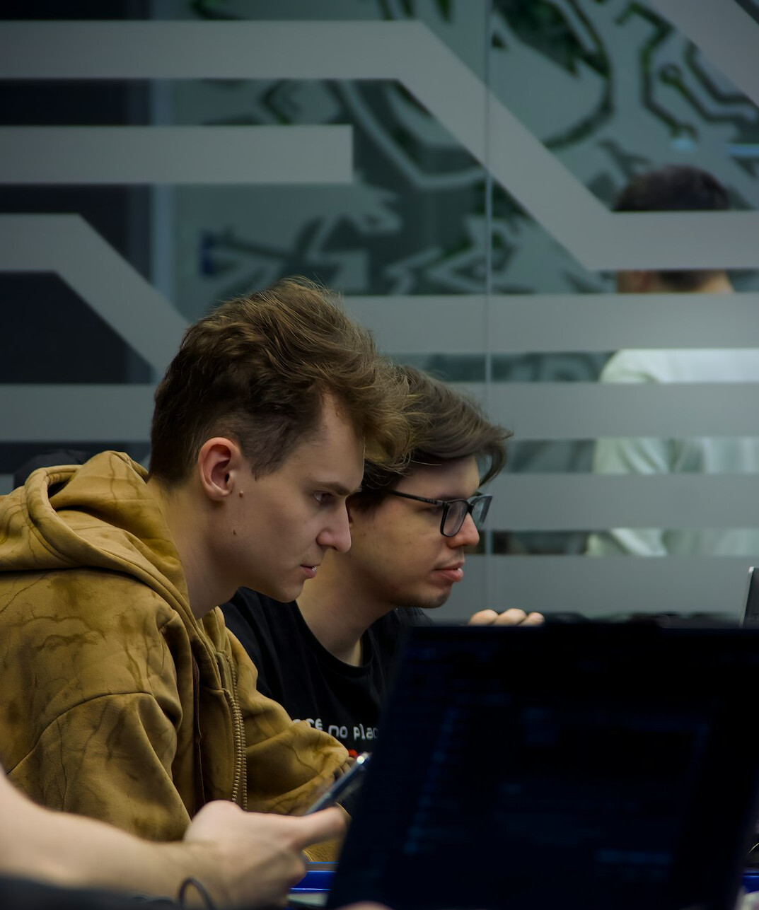 corporate team collaborating on code